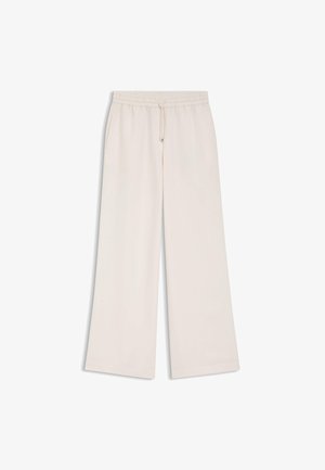 Pantalon ample à jambes larges de couleur crème avec taille élastique et cordon, comportant des poches latérales, présenté sur fond blanc.