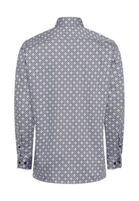 Langarmshirt met een marineblauw en wit bloemenpatroon, gemaakt van stof met een gladde textuur, inclusief knoopmanchetten en een klassieke kraag.