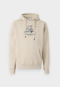 Beige hoodie lavet af blødt stof, med en frontlomme og snoretræk. Grafisk print af en karakter med en golfvogn.