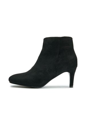 Black suede ankle boot with a pointed toe and a 3-inch heeled design. Smooth texture with minimal seams and no decorative accents.