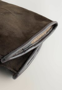 Dark brown suede pouch with smooth gray leather trim. Features a soft, textured surface and folded design with visible stitching.