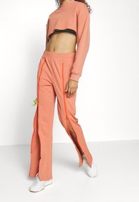 adidas by Stella McCartney Tracksuit bottoms - copper