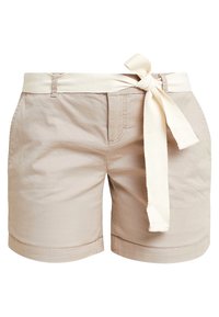 Shorts en coton beige avec une ceinture crème, dotés d'un front noué et de poches latérales. Le tissu a une texture lisse et une coupe ajustée.