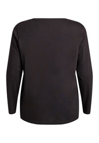 Mustast pehmest kangast pika varrukaga top. Ümar kaelus ja lõdvestunud lõige, allosas ja varrukaotstes ümarad ääred.