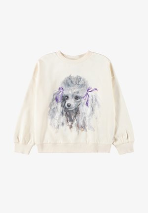 Sweat-shirt couleur crème avec un visage de caniche gris peint portant deux nœuds violets sur ses oreilles, centré sur le devant.