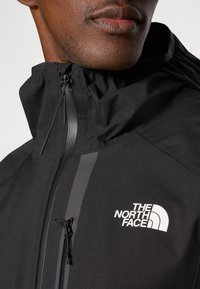 The North Face MOUNTAIN ATHLETICS RAINLIT HOODED JACK - Waterproof jacket - black