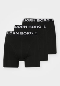 Black boxer briefs set of three, featuring a wide elastic waistband with "BJÖRN BORG" logo. Made from soft, stretchable fabric.