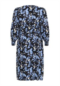 Robe à motif floral dans des couleurs noire, bleue et blanche. Les manches longues et une ceinture à la taille mettent en valeur la silhouette.
