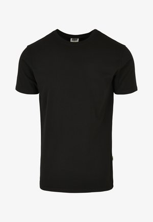Schwarzes Baumwoll-T-Shirt mit Rundhalsausschnitt, kurzen Ärmeln und geradem Schnitt. Mit einem kleinen Logosticker auf der linken Seite.