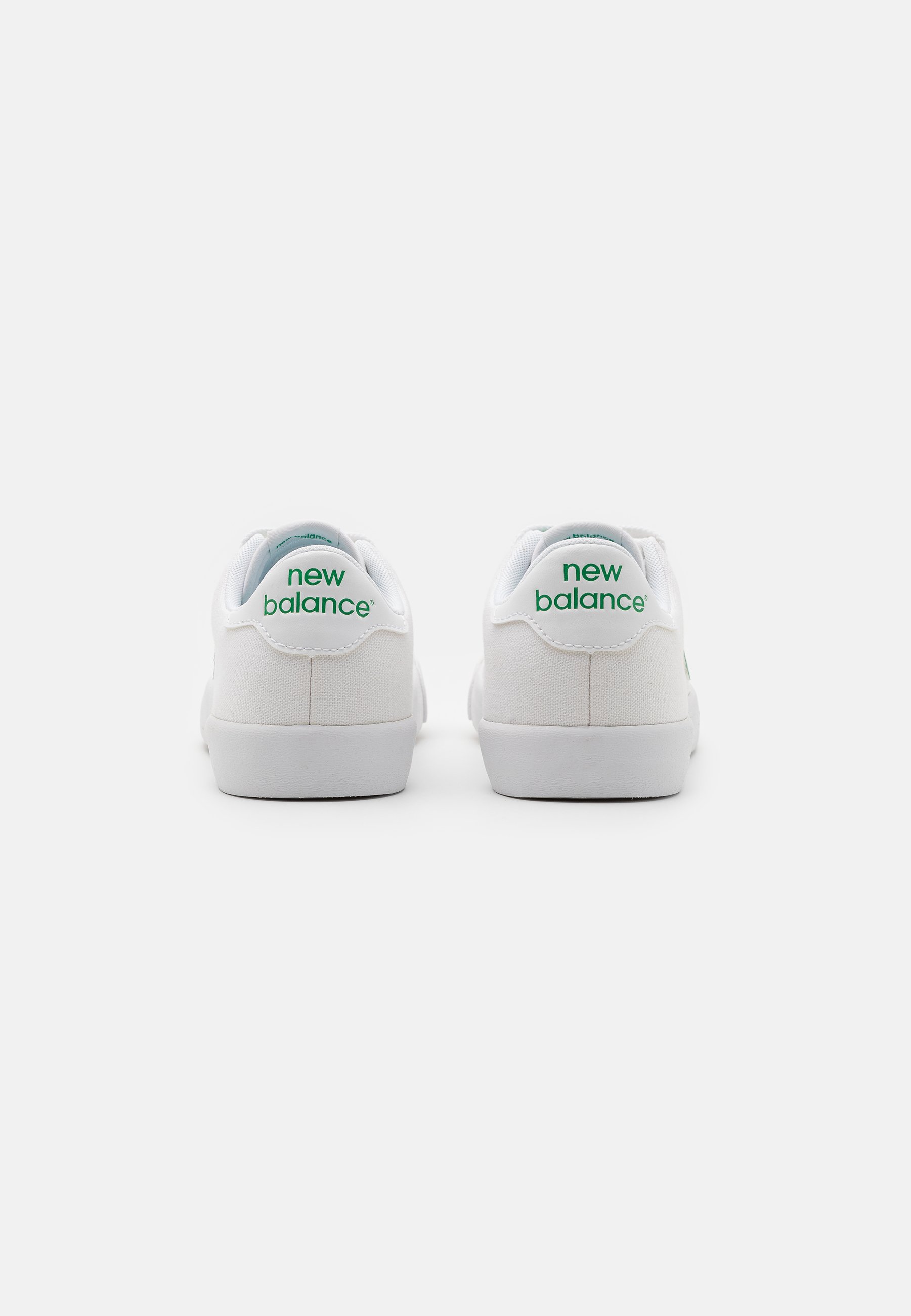 new balance white and green shoes