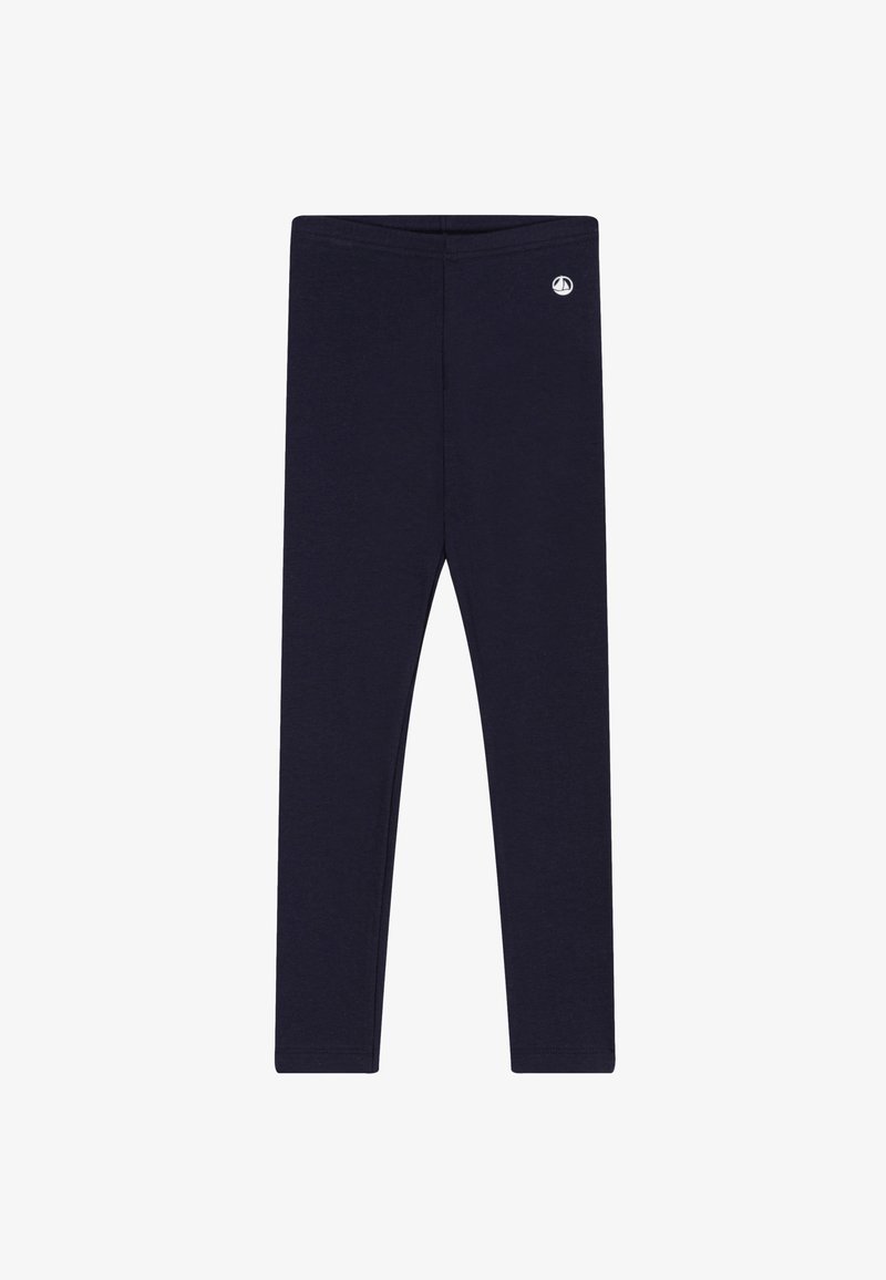 Colanți bleumarin până la gleznă, cu un mic logo alb cu o barcă cu pânze lângă talie, pe partea dreaptă.