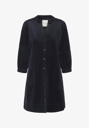 Mørk navy kordfløjlskjole med knaplukning foran, rund halsudskæring, trekvartærmer, elastiske manchetter og sidelommer.