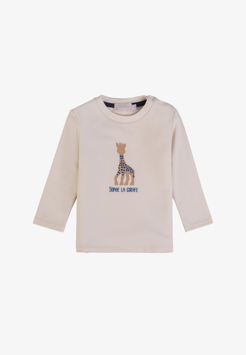 Maglietta a maniche lunghe color crema con grafica di una giraffa con pois blu e testo "SOPHIE LA GIRAFFE" sottostante. Materiale in cotone morbido.