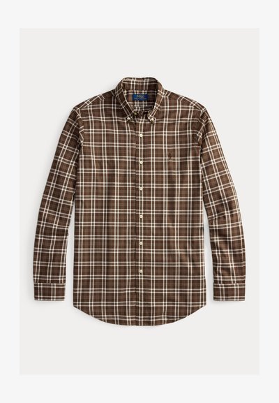 Pruun ruuduline pikakä sleeves särk, millel on valged kontrollmustrid, nööpidega krae ja valged nööbid siledal kangal. Mugav lõige.