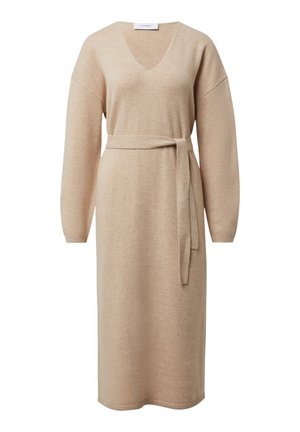 Beige knit dress featuring a V-neck, long sleeves, and a matching belt. The design is straight-cut with ribbed accents at the cuffs and hem.