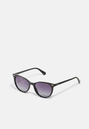 Black sunglasses with a sleek cat-eye shape, featuring gradient purple lenses and gold accent details on the frame.