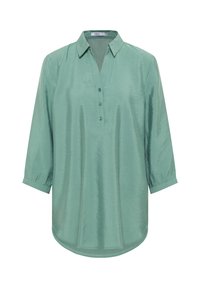 Chemisier vert clair semi-transparent avec un col pointu, un décolleté en V, trois boutons et des manches trois-quarts. Texture lisse avec une coupe légèrement décontractée.