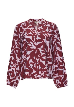 Langärmlige bordeauxfarbene Bluse mit hellrosa abstrakten Blättermustern, elastischen Bündchen und einer kleinen V-Aussparung am Kragen.