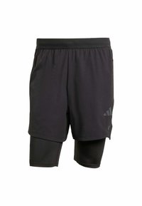 Schwarze Sportshorts mit integrierter Innenschicht, aus atmungsaktivem Material hergestellt. Mit dezentem Logo und strukturierter Textur. Verstellbarer Bund.