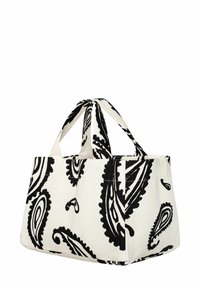 Bawełniana torba na ramię w kolorze kremowym z czarnym wzorem paisley, wyposażona w dwa płaskie uchwyty i mająca prostokątny kształt.