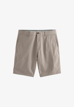 Shorts beiges en tissu léger, avec une fermeture à bouton, deux poches latérales et une coupe droite avec une texture lisse.