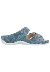 Blue snake-patterned sandals feature a slip-on design, cross-strap detail, and a white sole with a textured footbed for comfort.