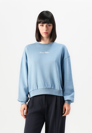 Felpa in cotone blu con collo a giro, polsini e orlo a coste. Presenta un logo bianco ricamato sul petto.