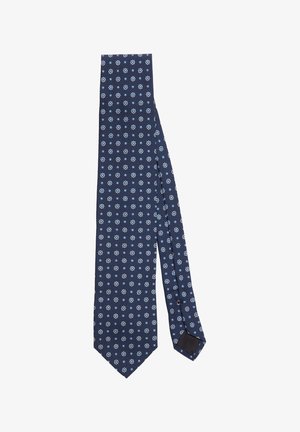 Cravate bleu marine avec un motif floral blanc et bleu clair, en tissu lisse, de forme étroite et avec un design à pointe standard.