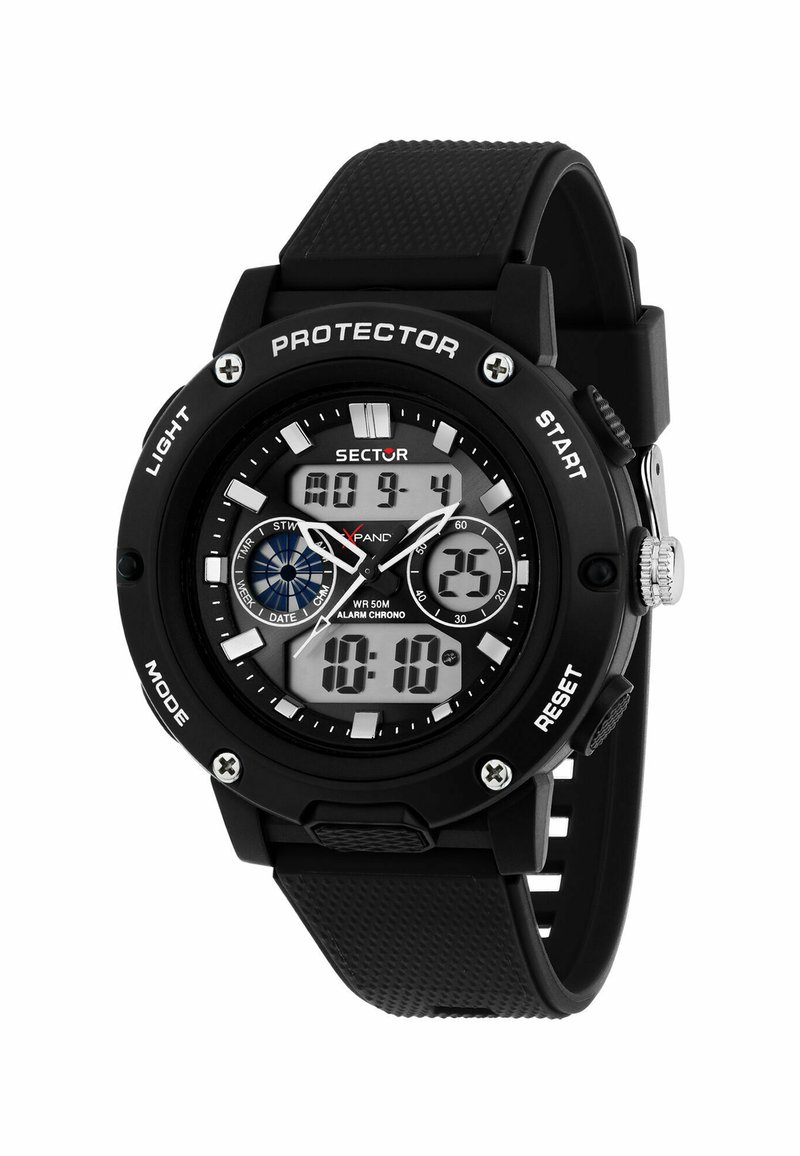 Digital sports watch with a black rubber strap, round case, white and black dial, silver accents, features include backlight and stopwatch.