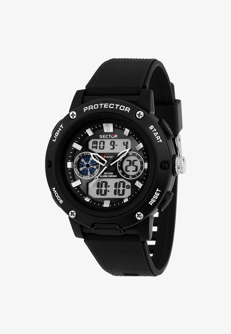 Digital sports watch with a black rubber strap, round case, white and black dial, silver accents, features include backlight and stopwatch.