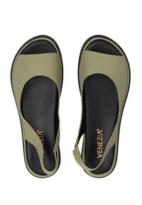 Grüne Leder-Sandalen mit minimalistischem Design, offenen Zehen und schwarzer Sohle. Mit einem Slingback-Riemen und dezenten Nähdetails.