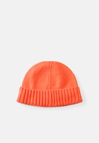 Knit beanie in bright orange, featuring a ribbed cuff. Soft, smooth texture with a rounded top. Ideal for cold weather.