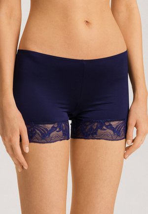 Navy blue boyshorts with a smooth, stretchy fabric and lace trim featuring a floral pattern at the hem. Soft and fitted design.