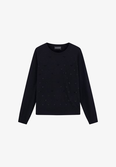 Maglione blu navy con maniche lunghe, scollo rotondo e motivo testurizzato di piccoli motivi sottili sul davanti. Tessuto morbido.