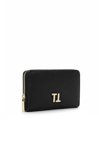 Black leather wallet with a zip closure, featuring a gold logo accent. The texture is smooth, and the design is rectangular and compact.