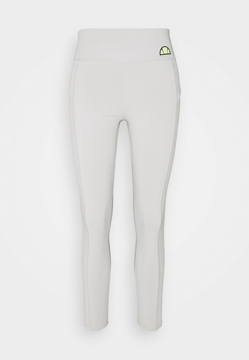 Jasnoszare legginsy bezszwowe z wysokim stanem i małym zielono-czarnym logo w kształcie półksiężyca po lewej stronie.