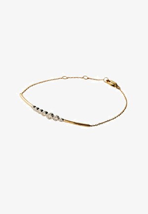 Pulsera delicada de cadena de oro con una barra curva que presenta seis pequeños diamantes redondos y un cierre de langosta.