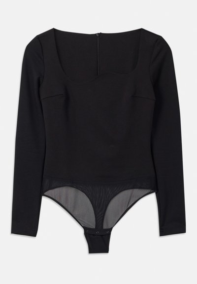 Juodas ilgomis rankovėmis bodžiukas su kvadratiniu iškirpimu ir tinklinėmis detalėmis apačioje. turi užtrauktuko uždarymą nugaros pusėje ir spaudimo mygtukus patogiam prigludimui.