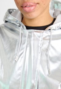 Rains STRING JACKET UNISEX - Veste légère - mirror
