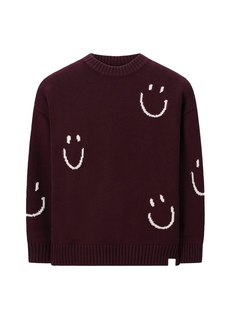 Donker kastanjebruine gebreide trui met meerdere witte glimlachende gezichten verspreid over de voorkant en mouwen, met ribgebreide manchetten en zoom.