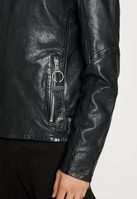Gipsy by Mauritius SANJU - Casaco de couro - black