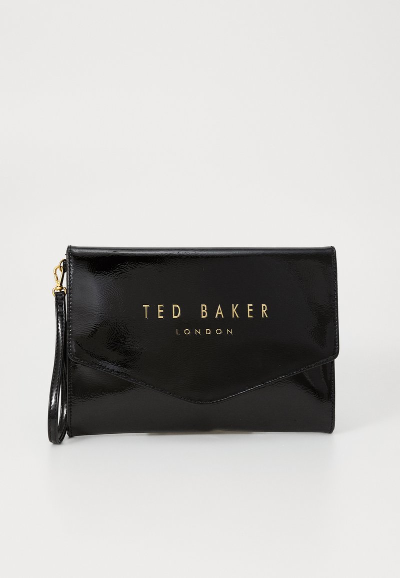 Black patent leather clutch with a fold-over design, gold "TED BAKER LONDON" logo, and a detachable wrist strap. Smooth texture, minimal accents.
