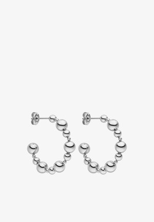 Silver hoop earrings featuring a beaded design with varying sizes of spherical shapes, polished finish, and post-back closures.