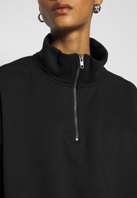 Monki Felpa - black