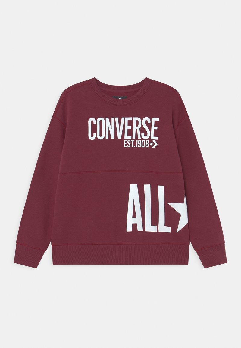 Sweat-shirt bordeaux à manches longues et col rond avec le texte blanc "CONVERSE EST. 1908" sur la poitrine et "ALL" avec une étoile sur le bas.