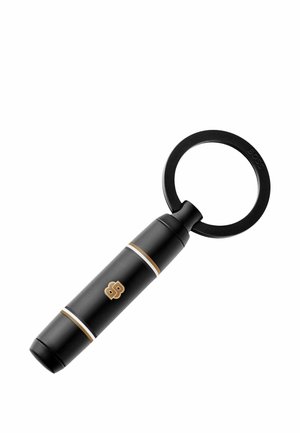 Portachiavi cilindrico nero con strisce dorate e bianche, logo "BB" dorato e un anello rotondo nero attaccato a un'estremità.
