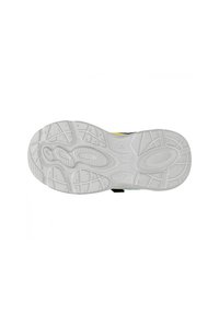 Semelle de basket présentant une semelle en caoutchouc blanc avec des motifs texturés pour une meilleure adhérence. Inclut un accent noir et jaune près du talon.