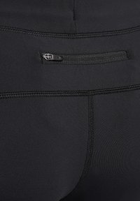 Zwarte sportleggings met een slank ontwerp, een gladde textuur en een geïntegreerde ritszak aan de achterzijde voor functionaliteit.