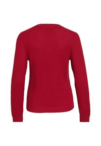 Pull en tricot rouge avec une texture, col rond, manches longues et poignets côtelés. Finition lisse à l'ourlet.