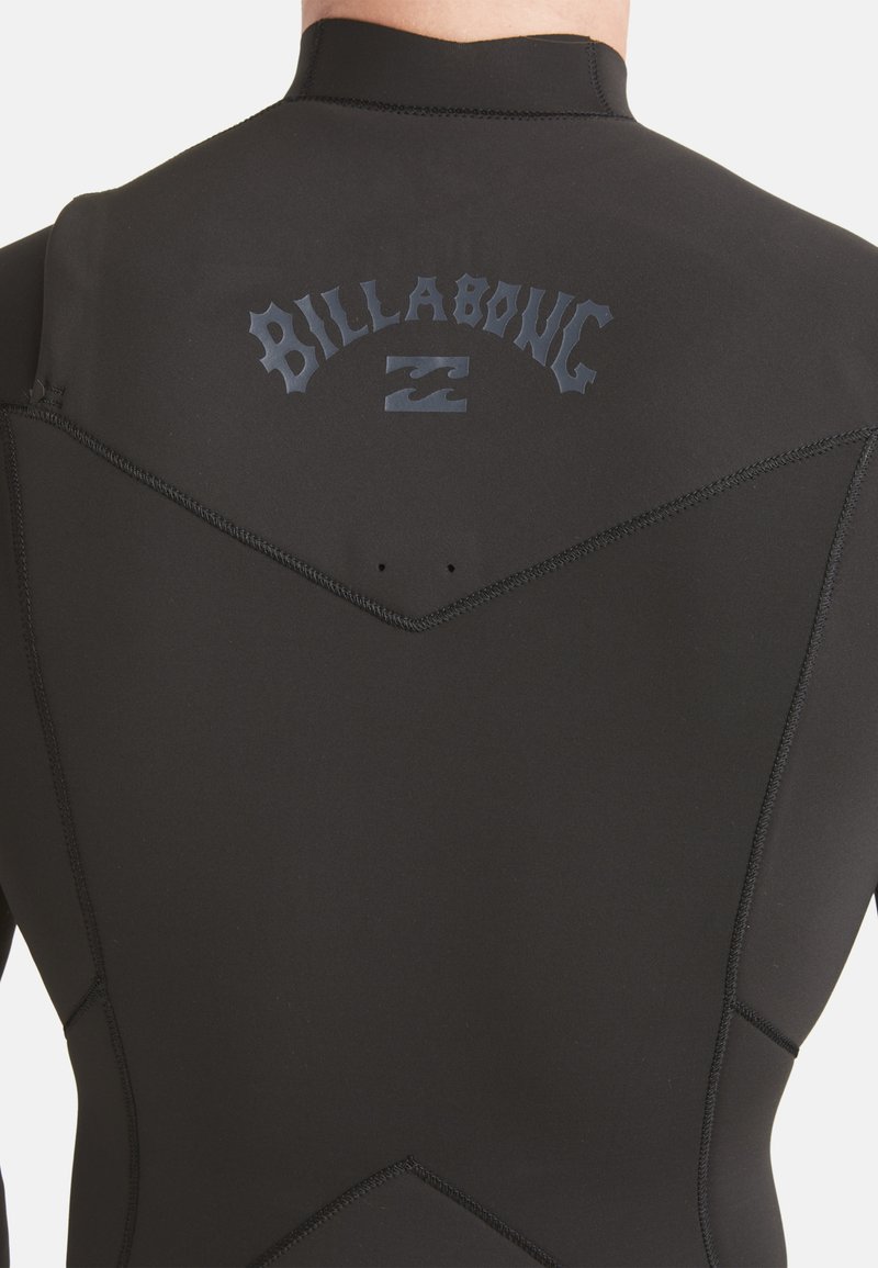 Black wetsuit with a smooth texture, featuring a logo on the back. It has a fitted design with contrasting stitching and a high collar.